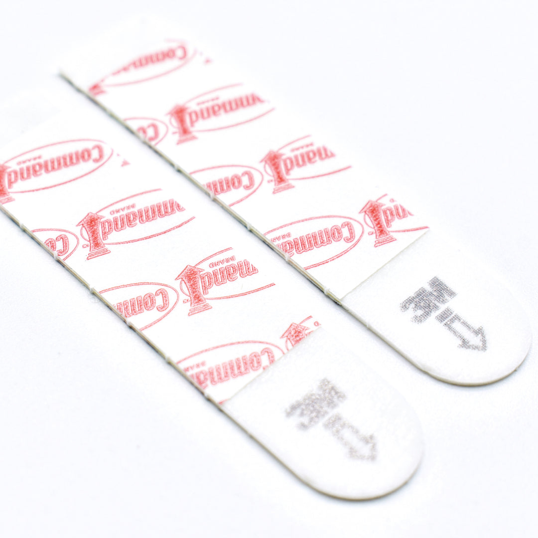 Command strips for wall mounted unit